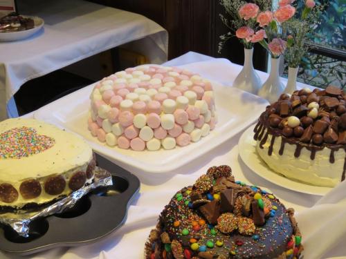 Four unique cakes are displayed