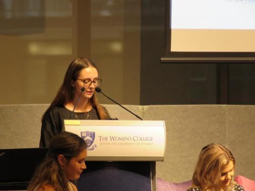 A student speaks at podium